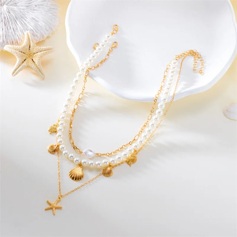 Colar com Pinguente de Concha com Pérola e Estrela-do-mar