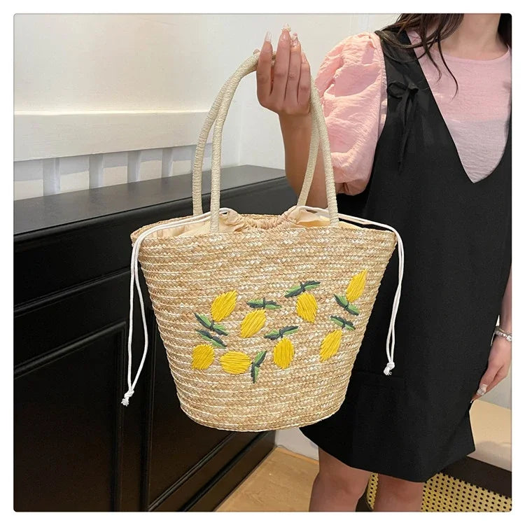 Bolsa de ombro de palha cor sólida com bordado de frutas