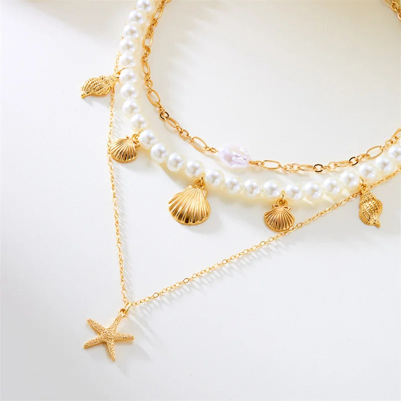 Colar com Pinguente de Concha com Pérola e Estrela-do-mar