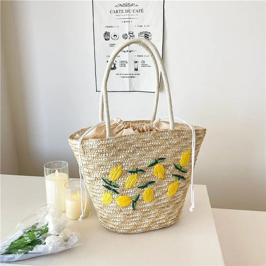 Bolsa de ombro de palha cor sólida com bordado de frutas