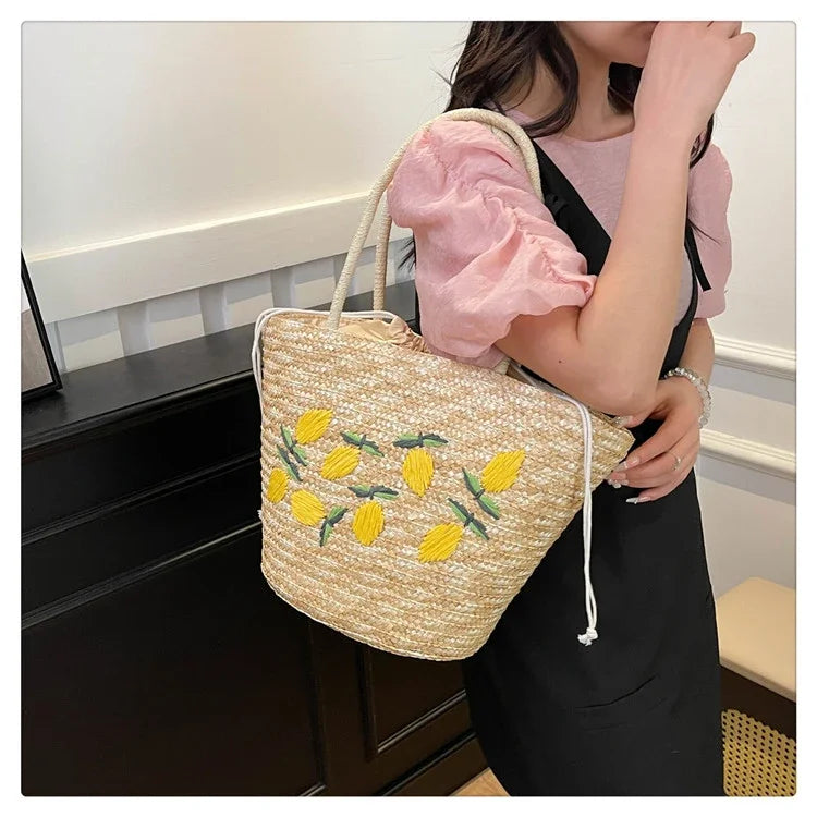 Bolsa de ombro de palha cor sólida com bordado de frutas