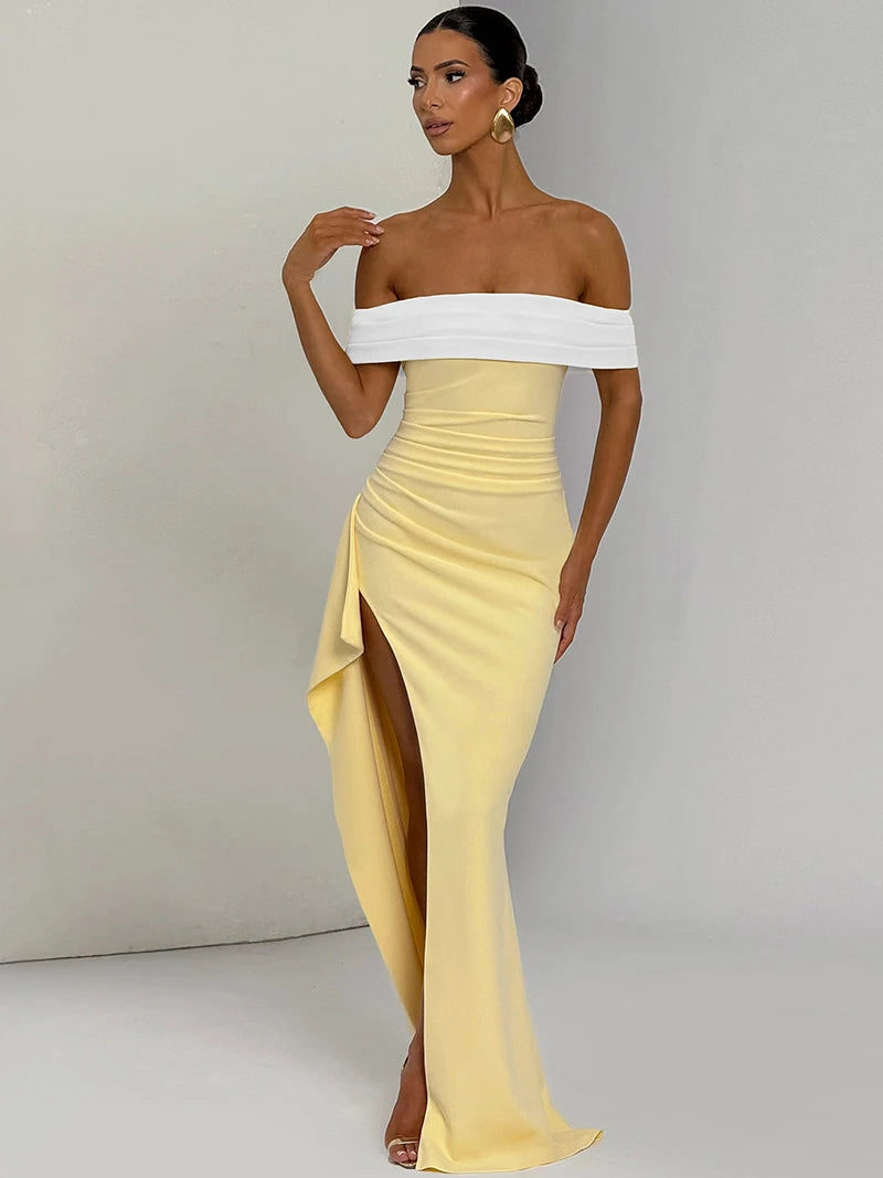 Vestido comprido sem alças, com drapeado e franzido lateral, elegante