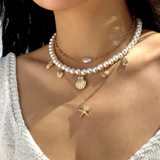 Colar com Pinguente de Concha com Pérola e Estrela-do-mar