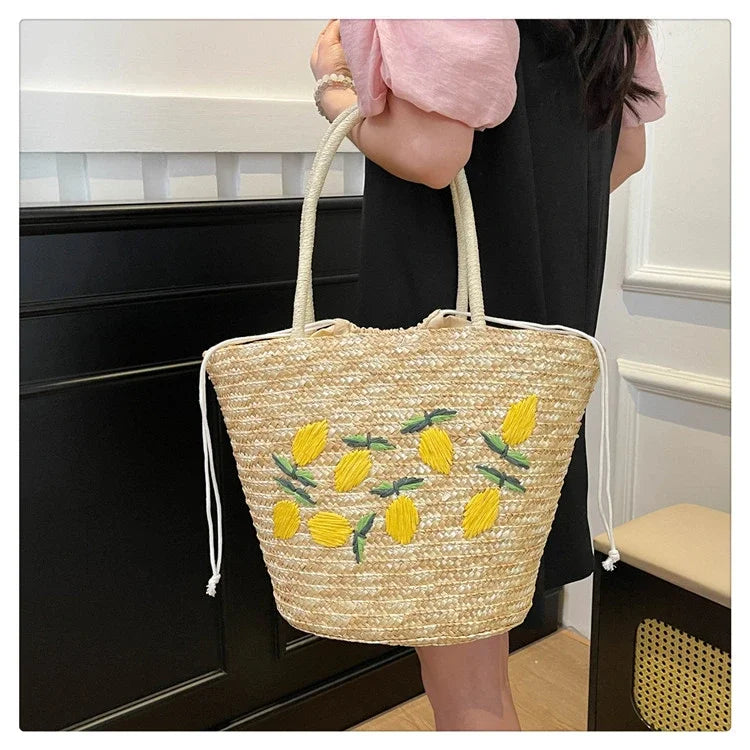 Bolsa de ombro de palha cor sólida com bordado de frutas