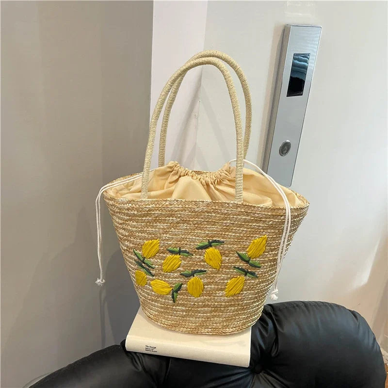 Bolsa de ombro de palha cor sólida com bordado de frutas